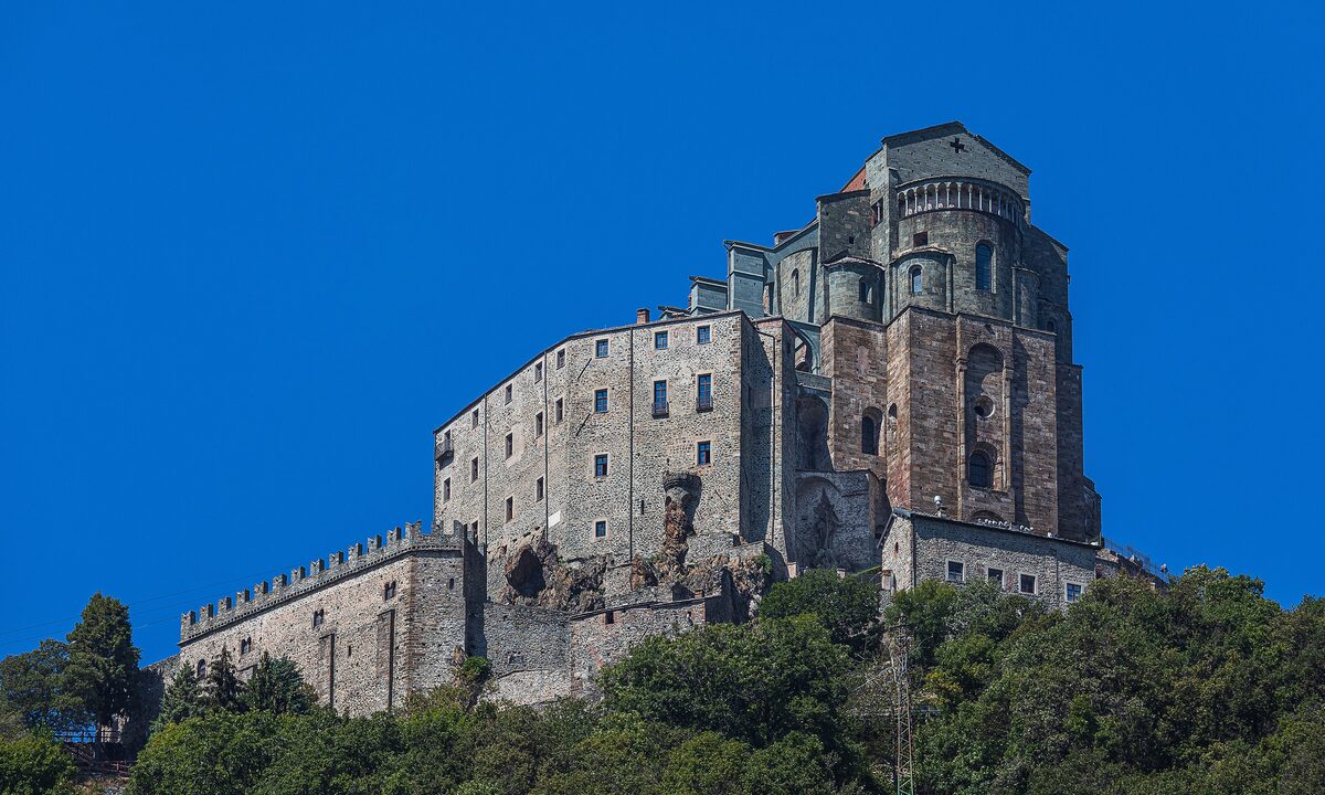 The Sacra di San Michele abbey on its rock above the trees