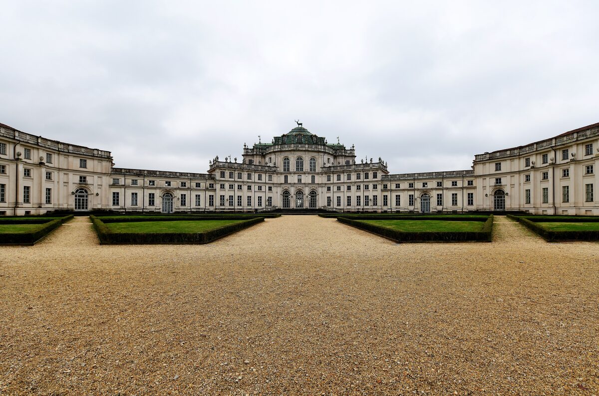 The hunting lodge of Stupinigi, its wings curving around a gravel court