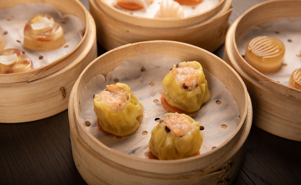Bamboo steamer baskets of shrimp siu mai and other dim sum