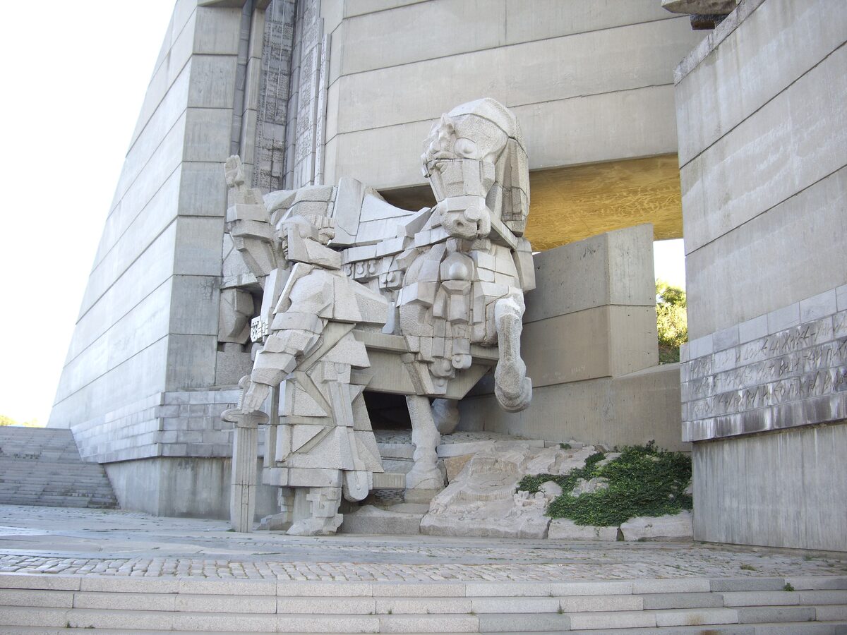 A giant angular concrete sculpture of a medieval Bulgarian ruler on horseback inside the Founders of the Bulgarian State monument in Shumen.