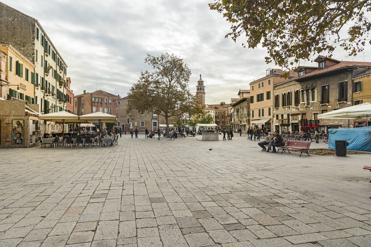 The long, open Campo Santa Margherita with café terraces, trees and old houses around it