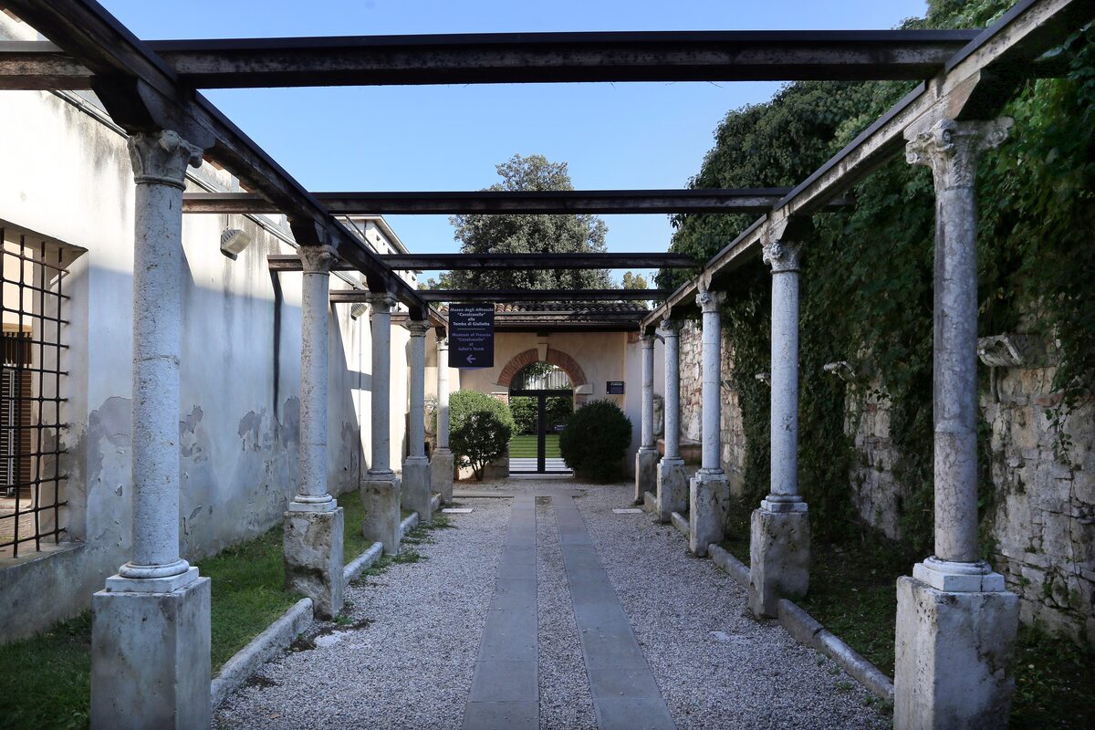 The columned pergola walk in the garden of Juliet's Tomb