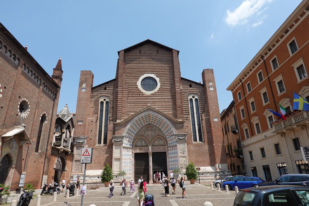 The brick Gothic facade and round window of Sant'Anastasia