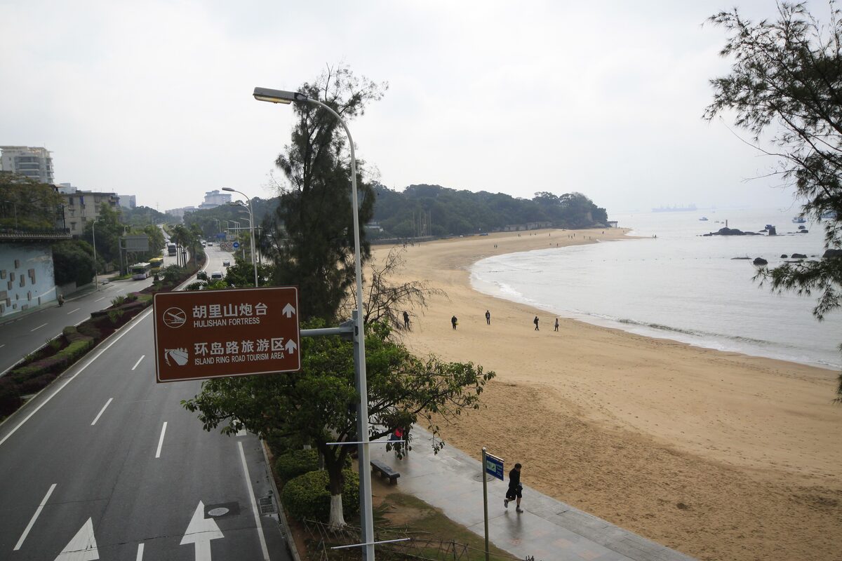 Huandao Road running beside a long sandy beach on the south-east coast of Xiamen Island