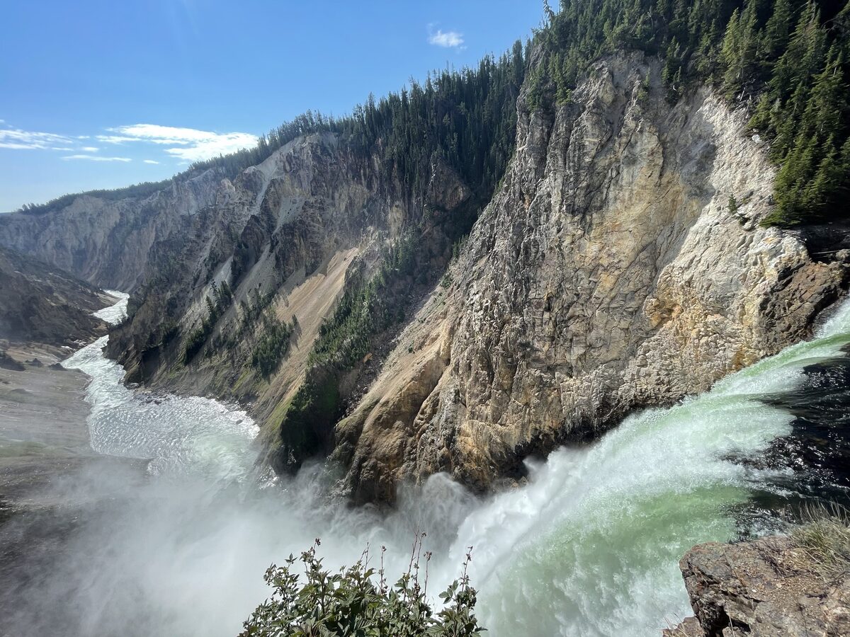 Water racing over the brink of the Lower Falls