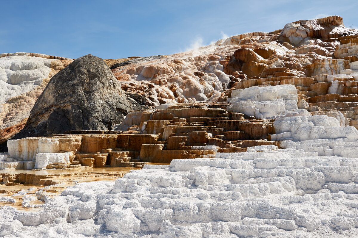 White and orange travertine terraces at Mammoth Hot Springs