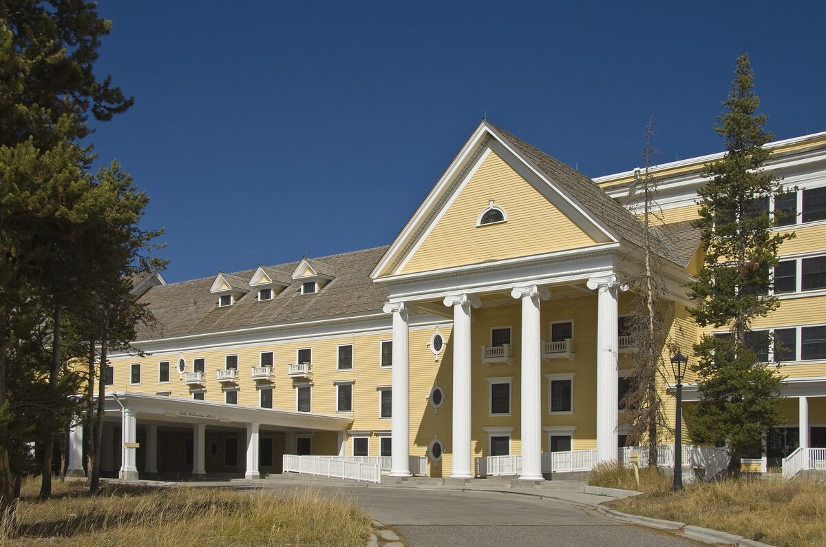 The yellow Lake Yellowstone Hotel with its white columns