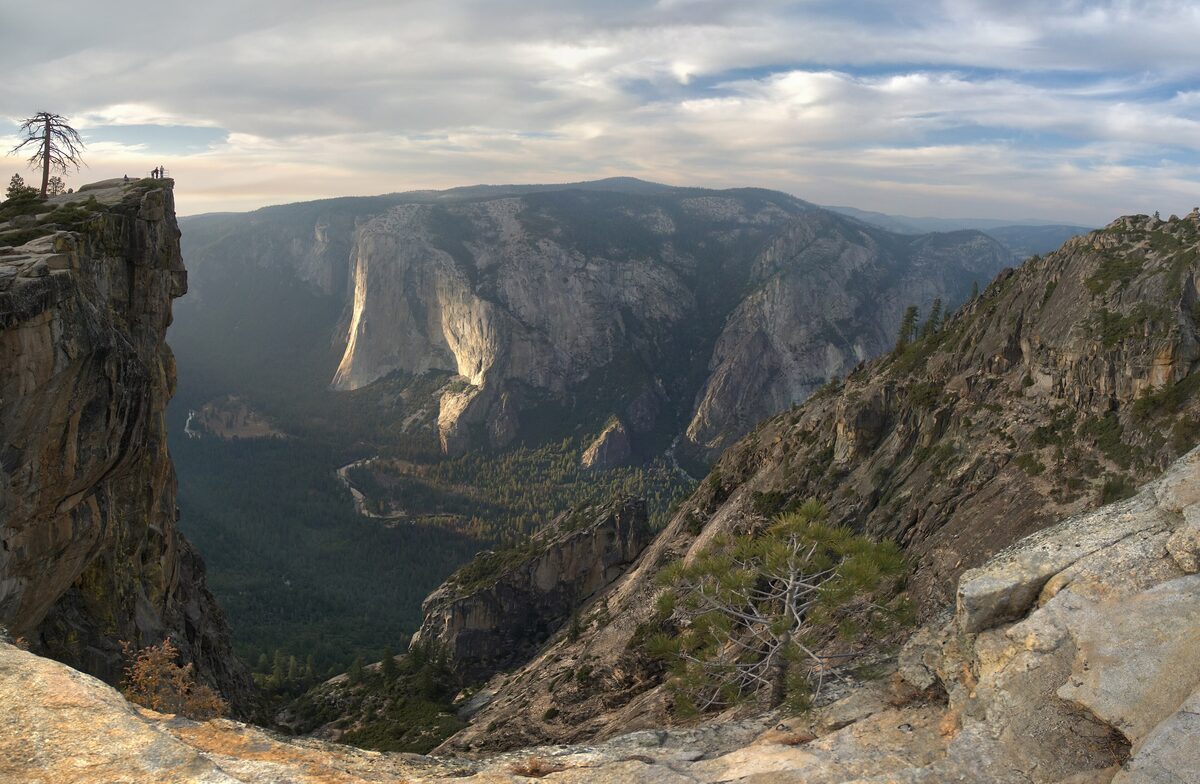 The granite ledge of Taft Point above Yosemite Valley and El Capitan