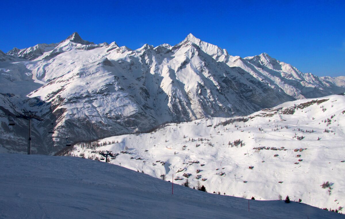 Snowy ski pistes and peaks around Riffelberg, seen from the slopes