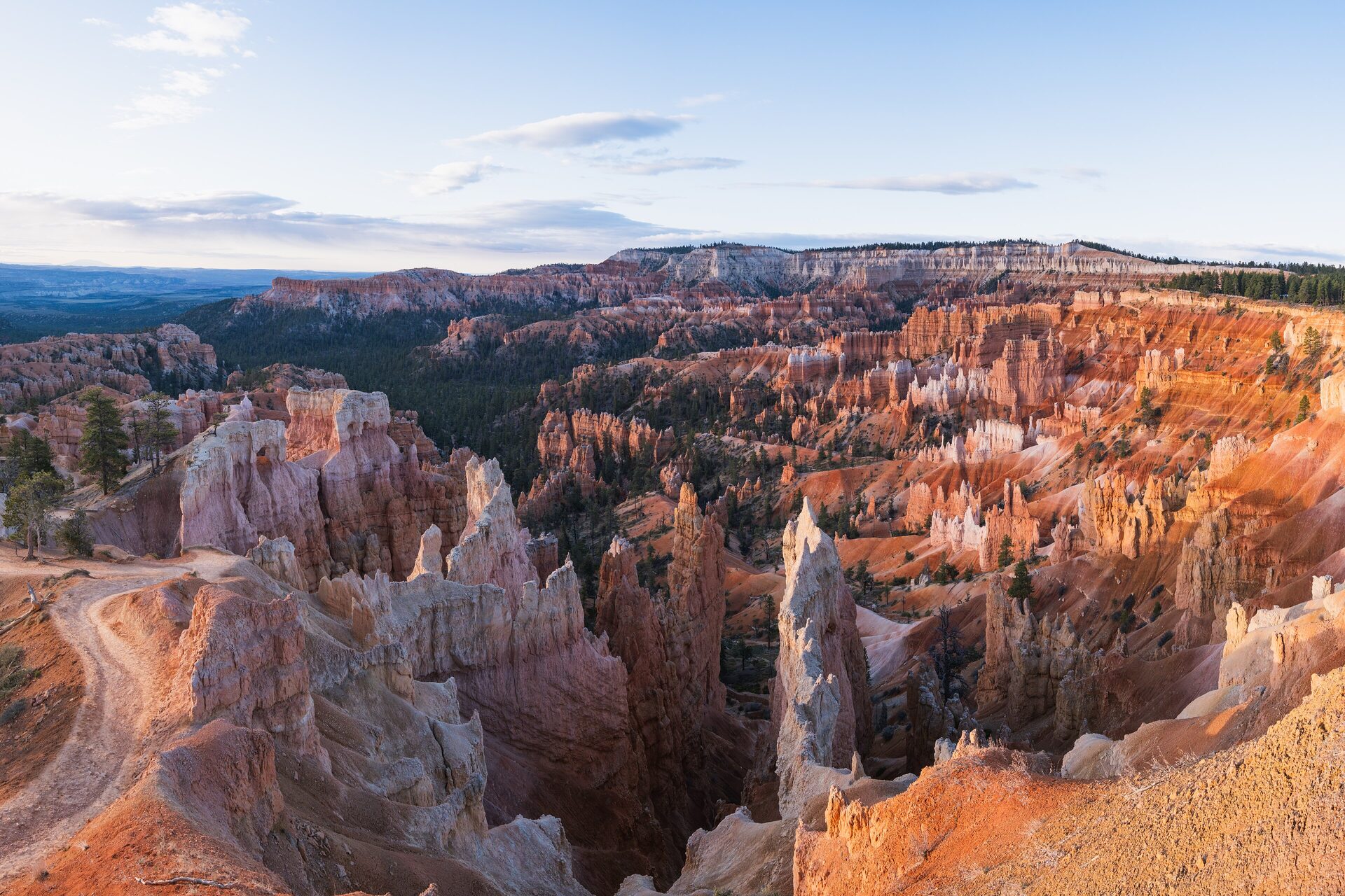 Bryce Canyon amphitheater hoodoos glowing in golden light at Sunrise Point