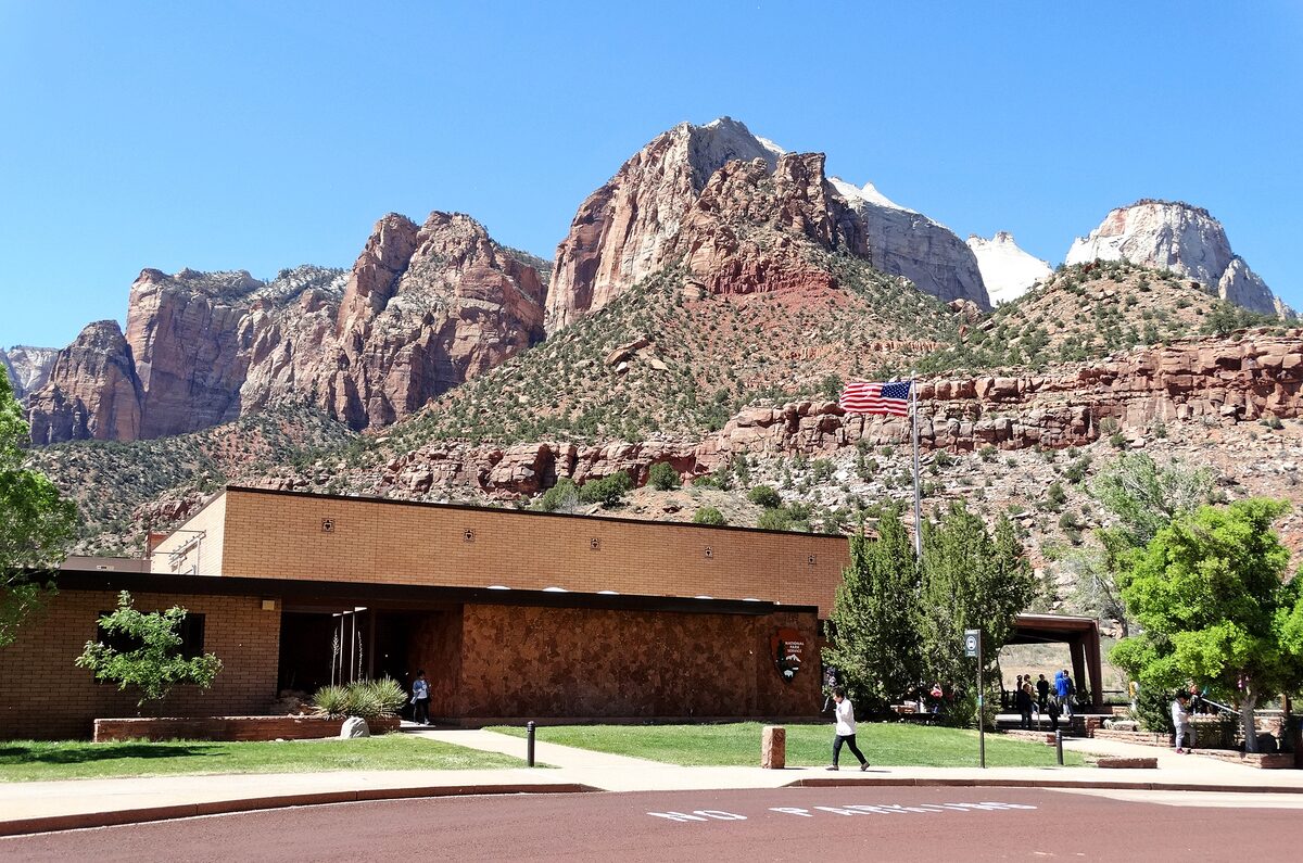 Human History Museum building with sandstone peaks rising behind it